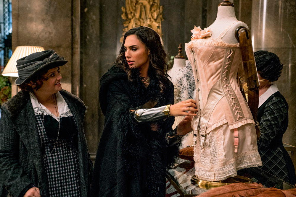 Diana Prince (Gal Gadot) with Etta (Lucy Davis) shopping for inconspicuous clothes.